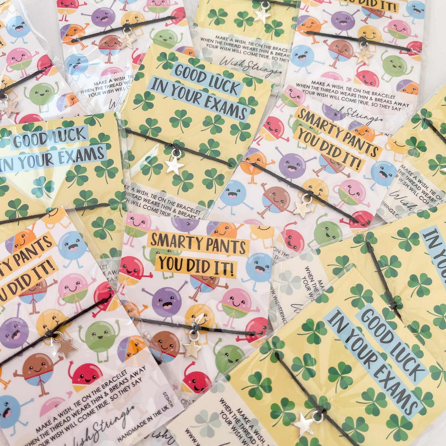 12 x WishStrings ‘Good Luck in Your Exams’ & ‘Smarty Pants You Did It’ Designs | RRP £3.99 Each | Fantastic Margins | Limited Stock