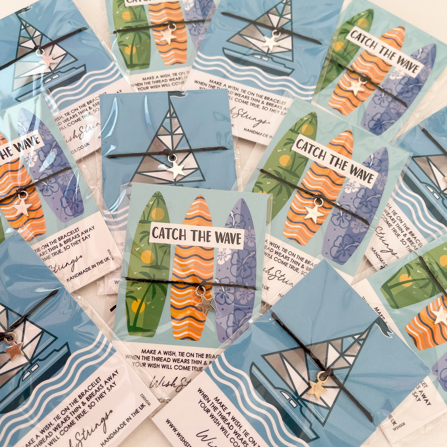 12 x WishStrings Boat & Surfboard ‘Catch the Waves’ Designs | RRP £3.99 Each | Fantastic Margins | Limited Stock
